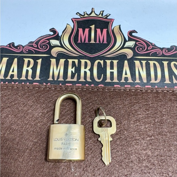 #308 Louis Vuitton Gold Lock and Key Set - Picture 3 of 7